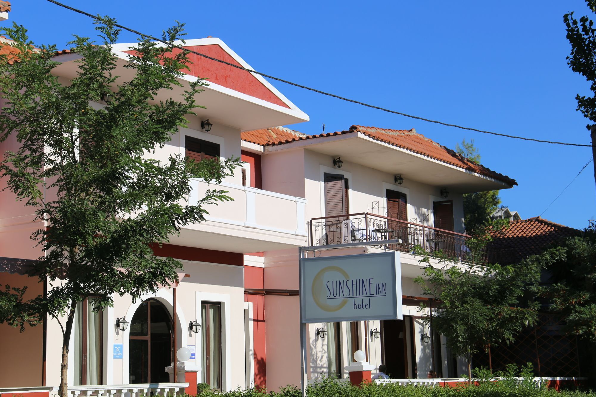 Sunshine Inn Hotel Лигия Экстерьер фото